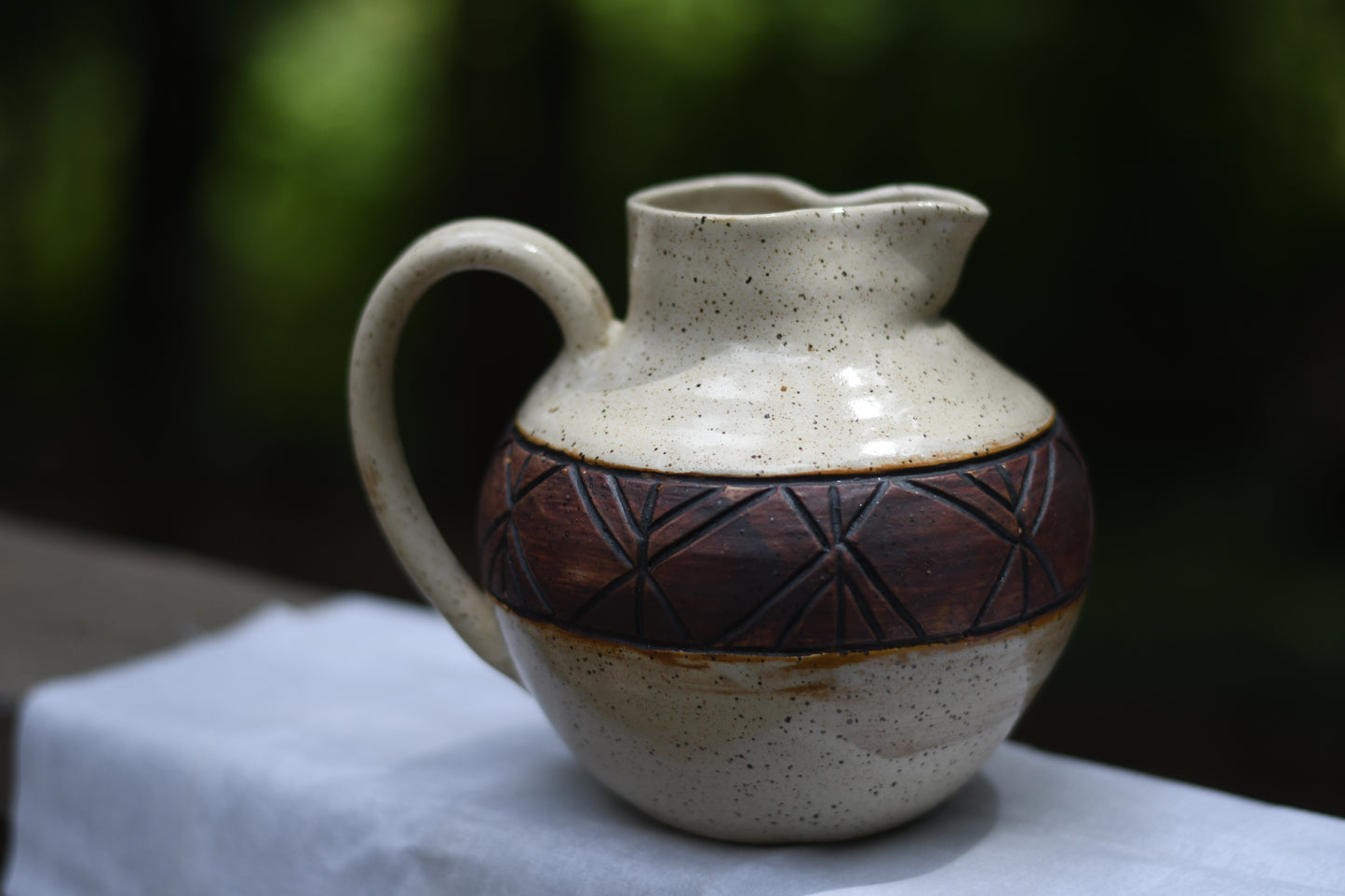 Carved Pitcher