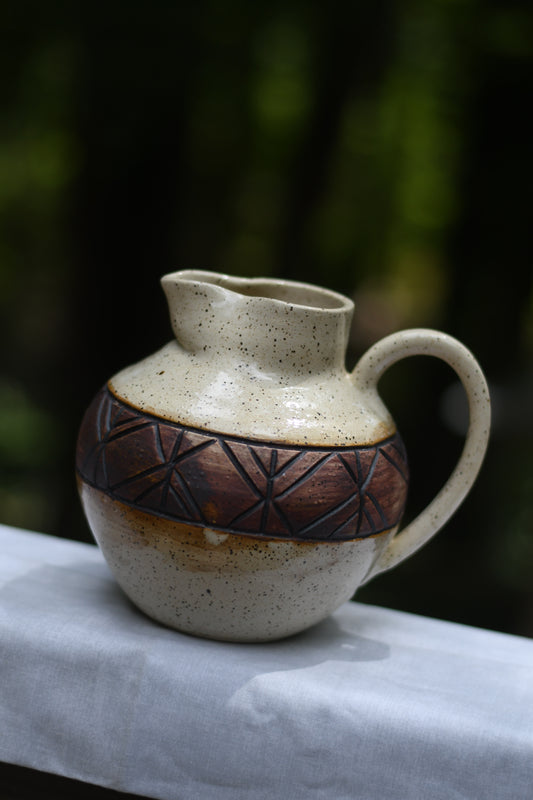 Carved Pitcher
