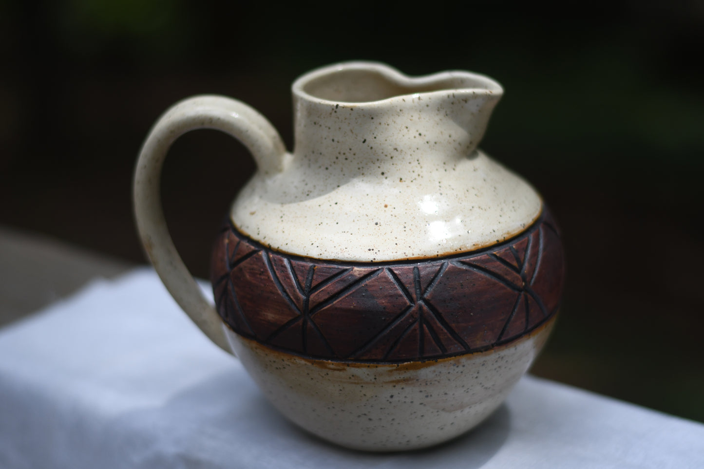 Carved Pitcher