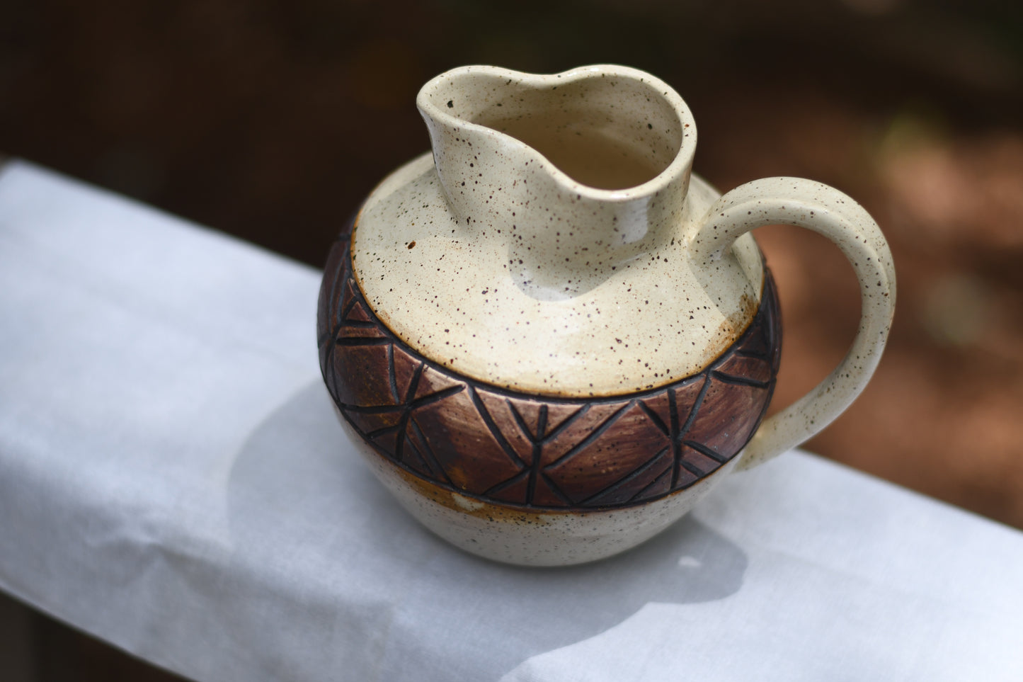 Carved Pitcher